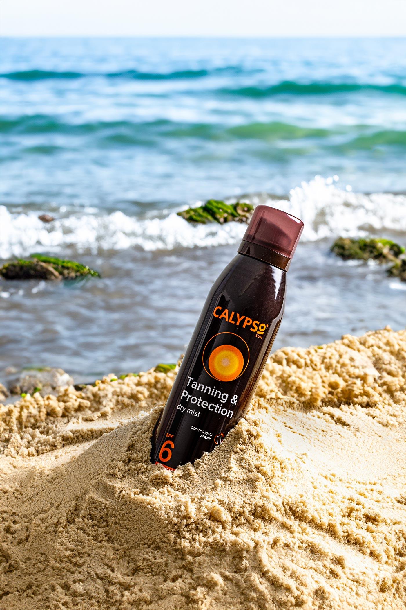 Calypso Tanning & Protection SPF6 lifestyle on a beach